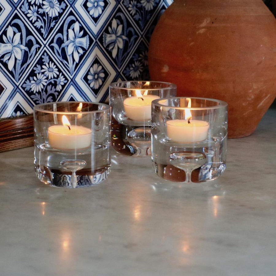 A set of 3 glass tealight holders 