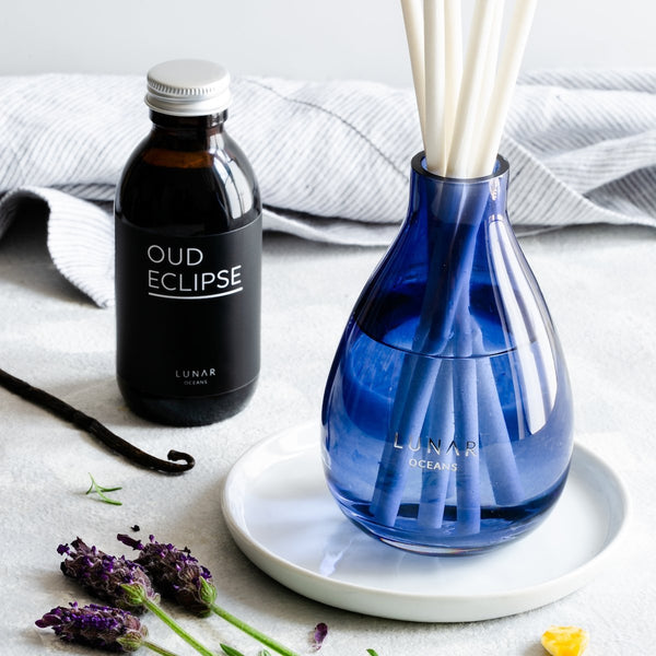Oud Eclipse Reed Diffuser in blue vase